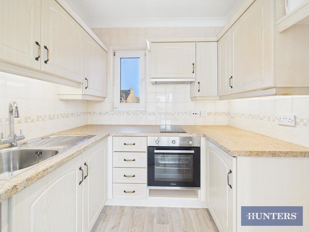 Property photo 3 of 12 Kitchen