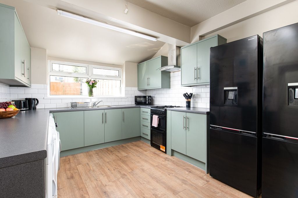 Property photo 3 of 14 Sleek Modern Kitchen With Dual Fridge-Freezers...