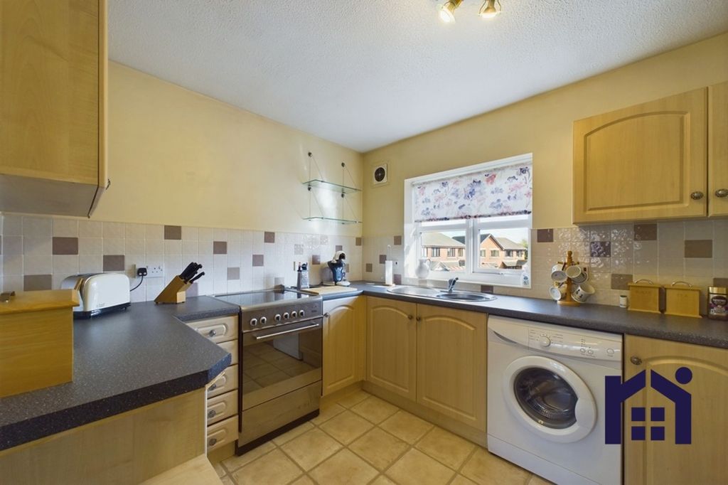Property photo 3 of 12 Breakfast Kitchen
