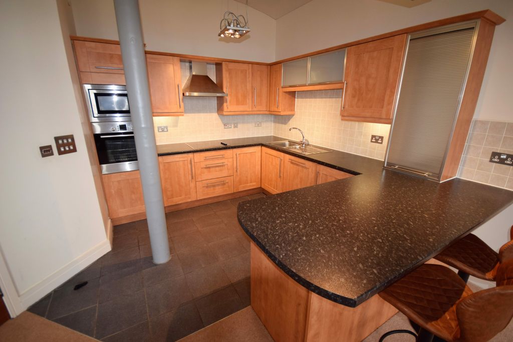 Property photo 3 of 9 Kitchen