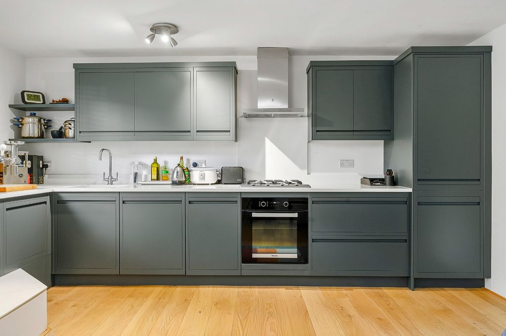 Property photo 3 of 12 Kitchen Area