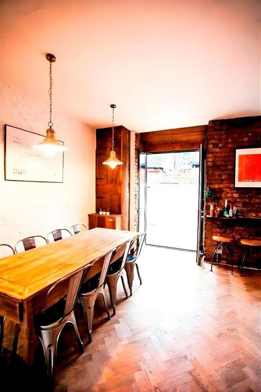 Property photo 2 of 12 Bright Dining Area With Long Wooden Table...