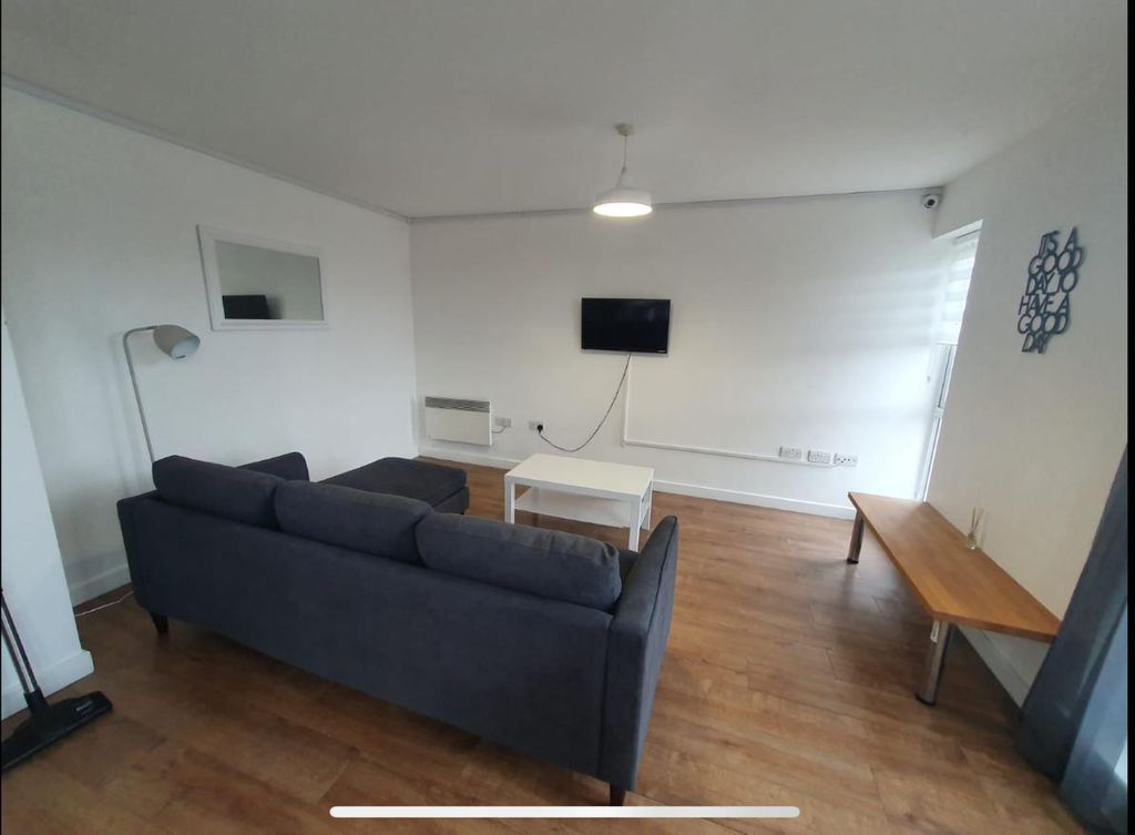 Property photo 3 of 11 Living Area.Png