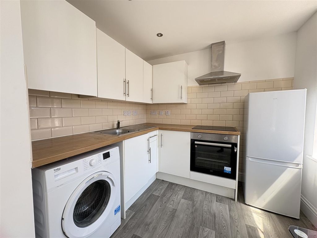 Property photo 2 of 6 Kitchen Area