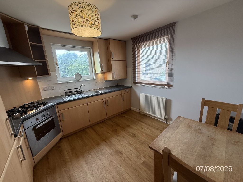 Property photo 2 of 12 Dining Kitchen