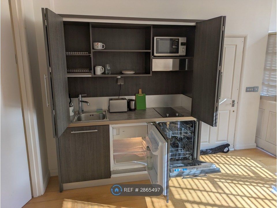 Property photo 3 of 11 Galley Style Kitchen