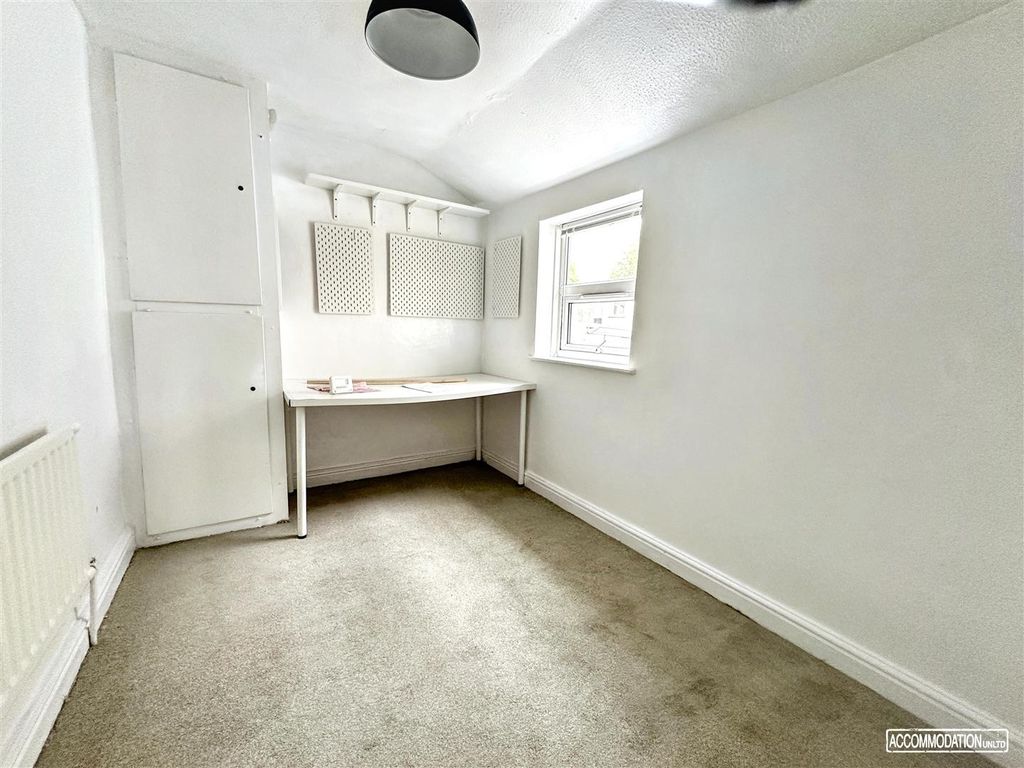 Property photo 1 of 12 Bright Study Area With Desk And Storage Space...