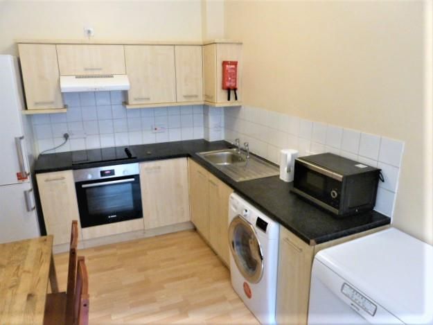 Property photo 2 of 9 Open Plan Kitchen