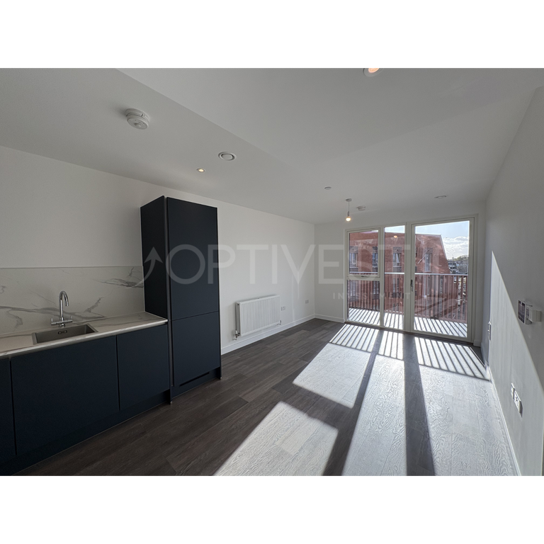 Property photo 3 of 13 Kitchen/Living Area