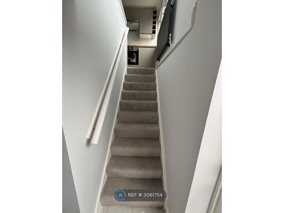 Property photo 2 of 13 Entrance Looking Up The Stairs Into Kitchen