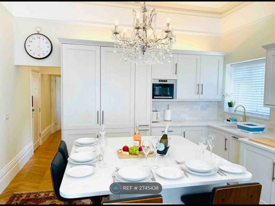 Property photo 1 of 8 Full Kitchen