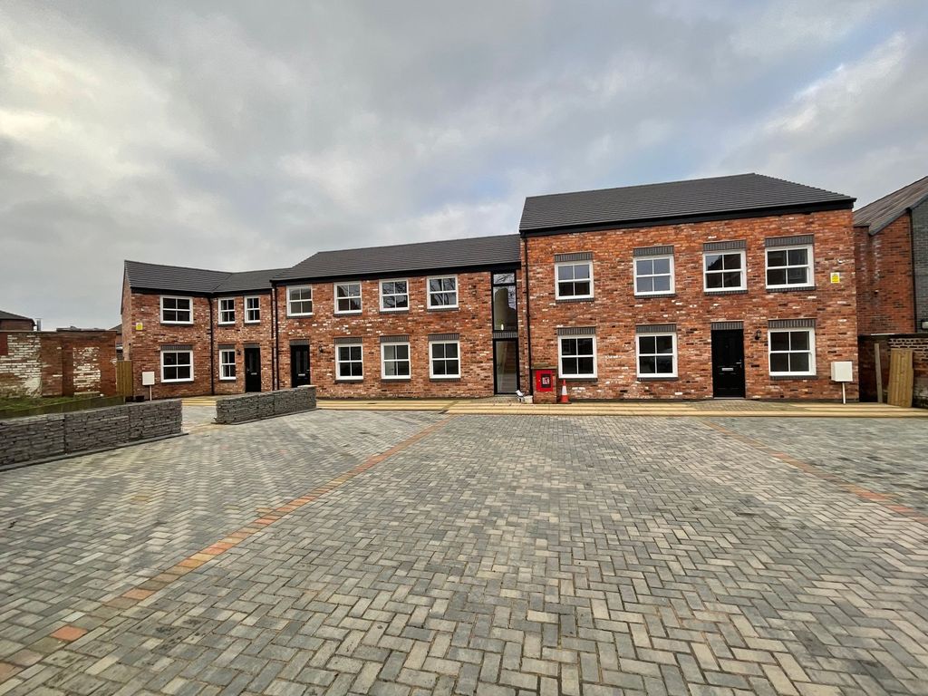 Property photo 3 of 9 Front