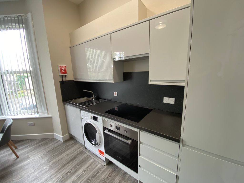 Property photo 2 of 16 Kitchen Area