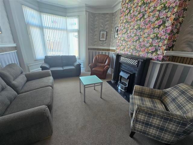 Property photo 2 of 8 Living Room