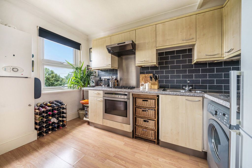 Property photo 3 of 9 Open-Plan Kitchen