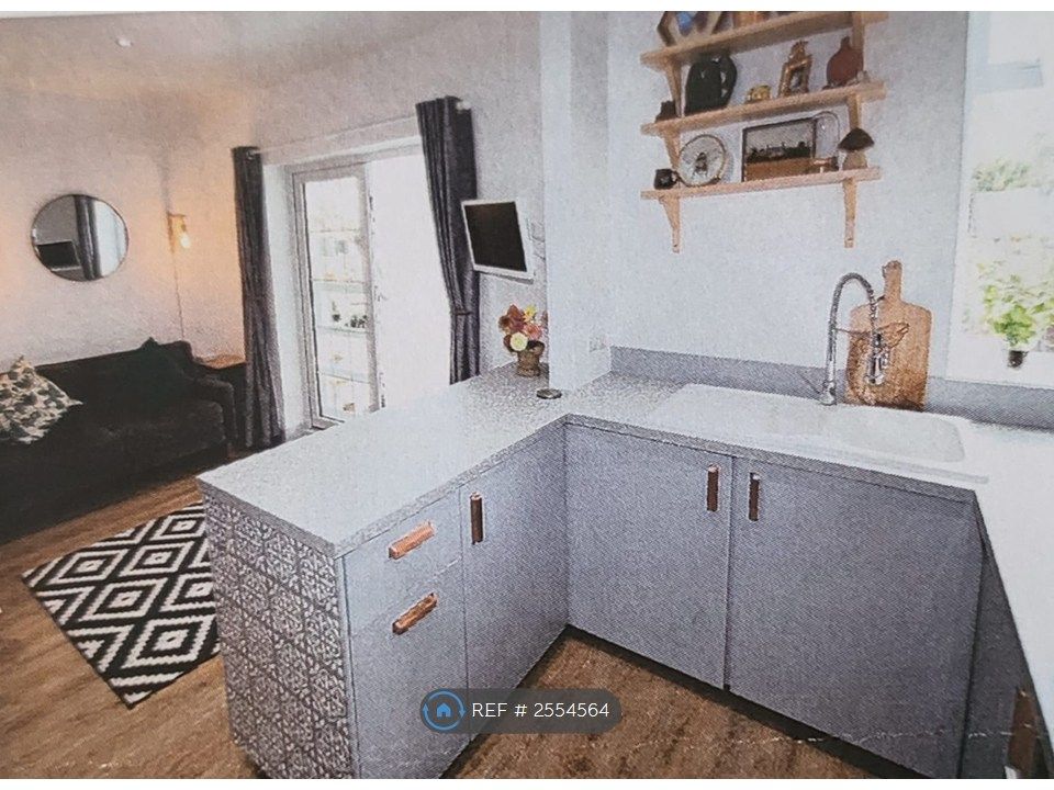 Property photo 1 of 13 Kitchen Area