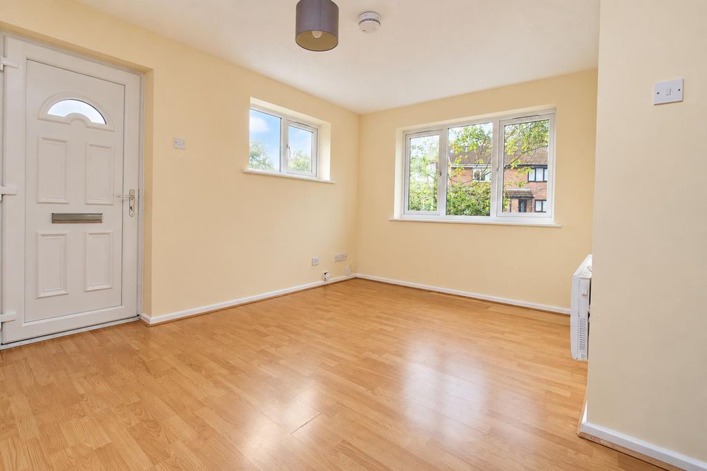 Property photo 3 of 6 Bright Neutral Empty Living Room.Png