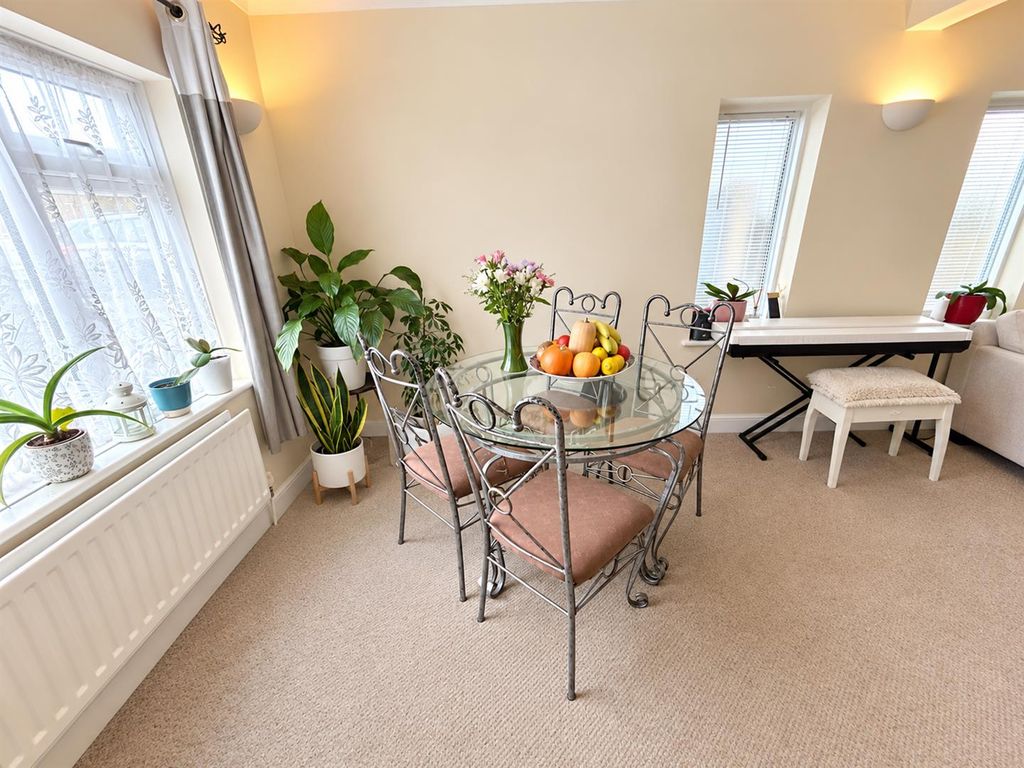 Property photo 3 of 12 Bright, Peaceful Plant-Filled Dining Room.Png