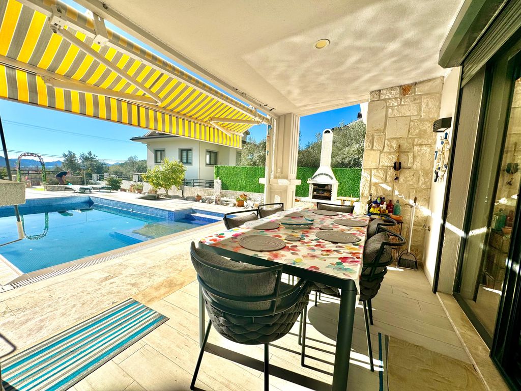 Property photo 3 of 28 A Lovingly-Maintained Smart Home Villa For Sale In Fethiye - Shady Terrace From The Living Space