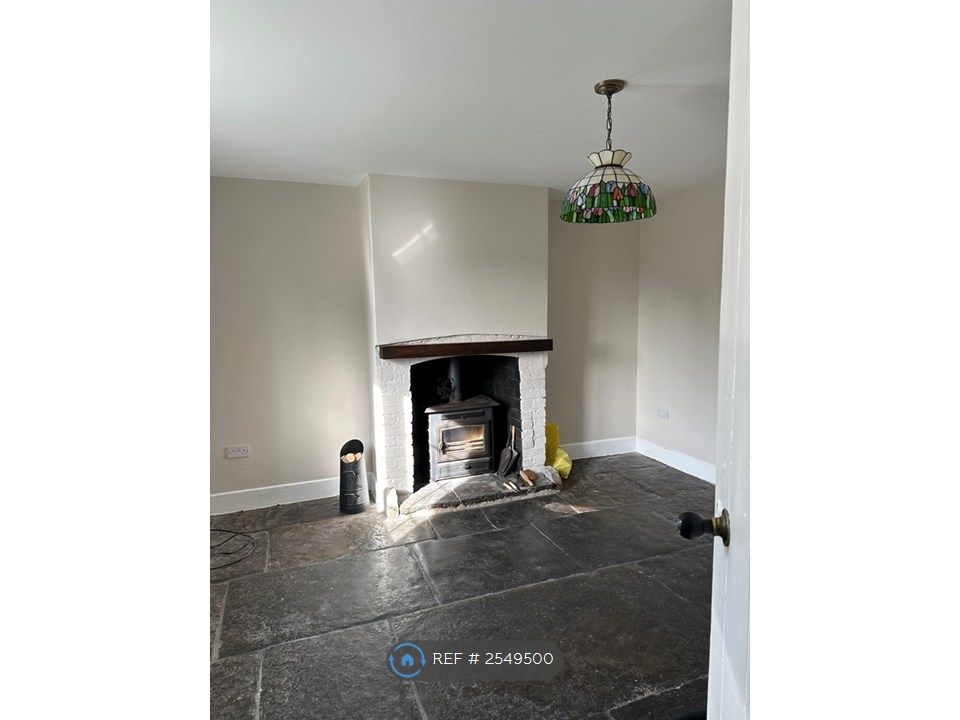 Property photo 2 of 13 Sitting Room With Log Burner