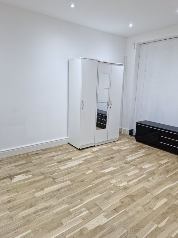 Property photo 2 of 9 Spacious Room With Modern Flooring And Storage...