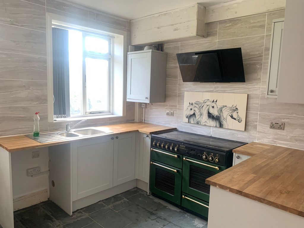 Property photo 3 of 11 Bright And Modern Kitchen Featuring A Large Window...