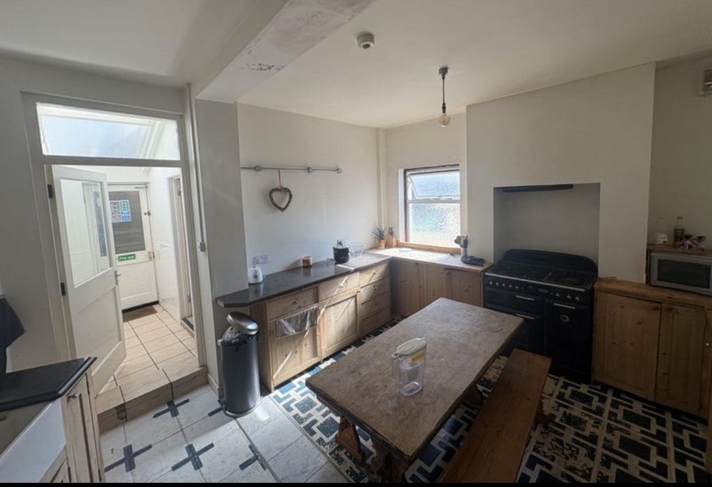 Property photo 3 of 6 Bright Kitchen With Dining Table And Skylight...