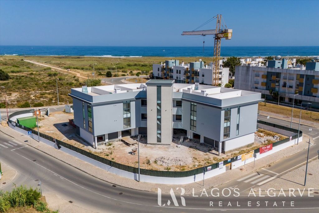 Property photo 1 of 33 3-Bedroom Apartment With Swimming Pool And Garage, Just Steps From Meia Praia Beach