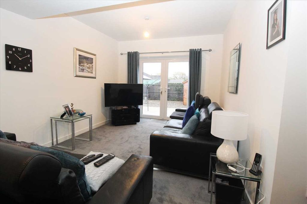 Property photo 3 of 12 Living Room (Rear)