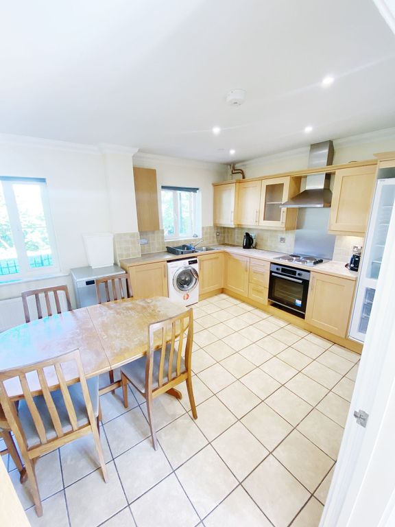 Property photo 2 of 14 Bright, Well-Equipped Kitchen With Natural Light F...