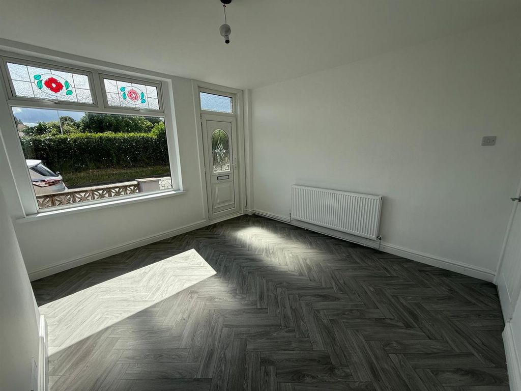 Property photo 2 of 12 Park Frontroom.Jpeg