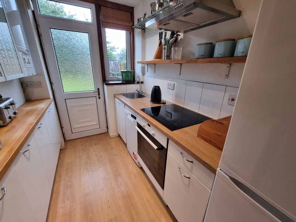 Property photo 3 of 7 Kitchen