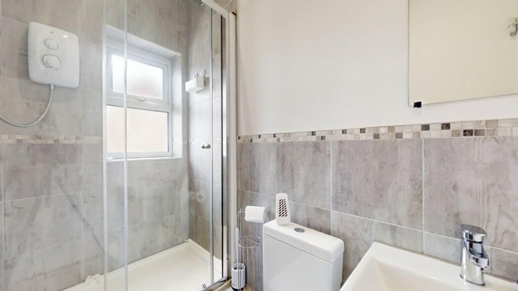Property photo 2 of 13 Bright And Modern Bathroom Suite Featuring A Spaci...