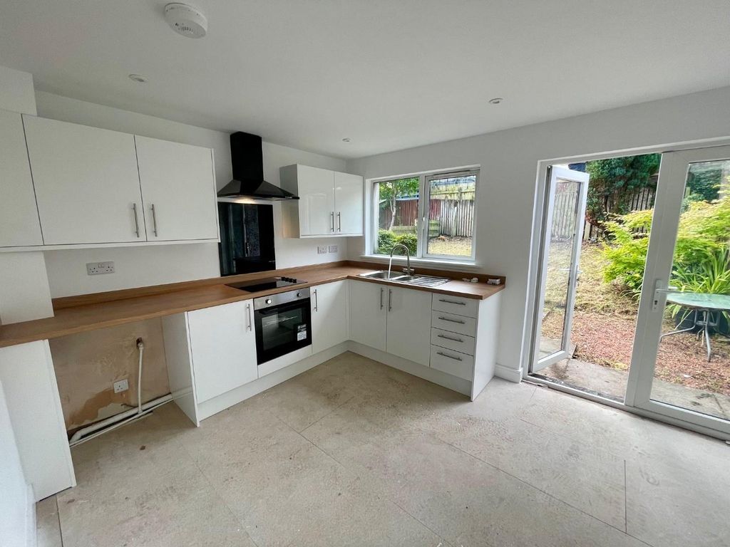 Property photo 2 of 14 Dining Kitchen