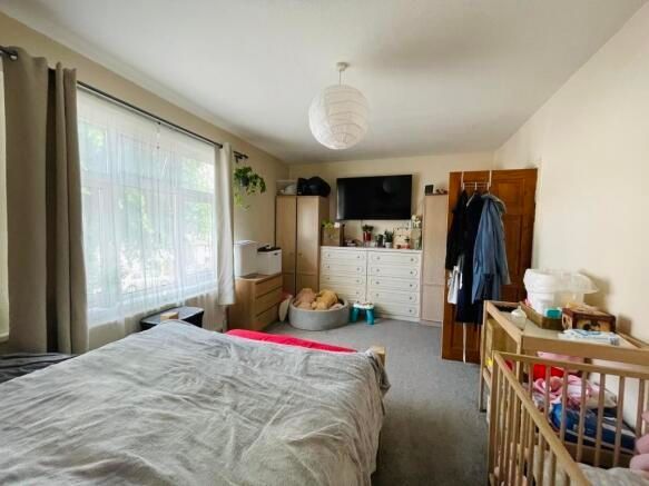 Property photo 2 of 12 Bright And Inviting Master Bedroom Featuring A Spa...
