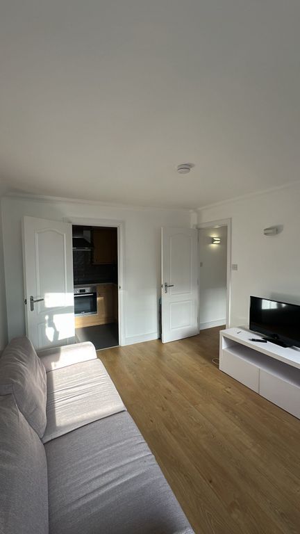 Property photo 3 of 9 Living Room Towards Kitchen