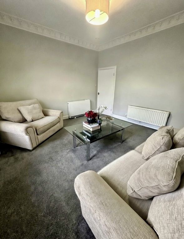 Property photo 3 of 6 Living Area