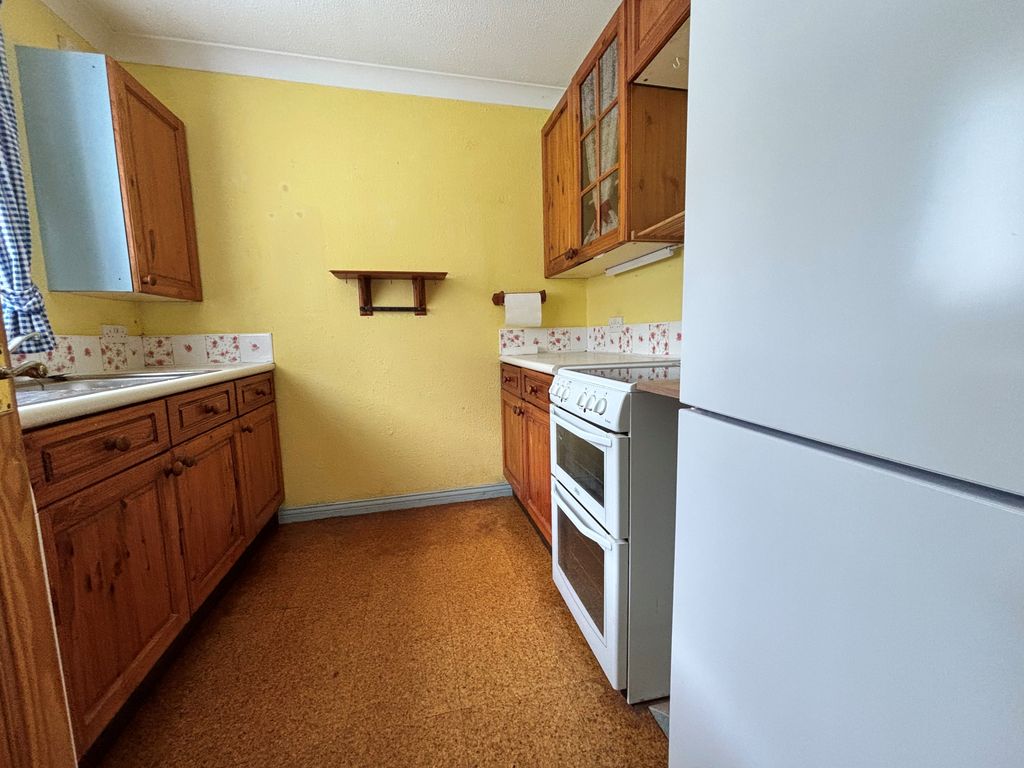 Property photo 3 of 7 Kitchen 