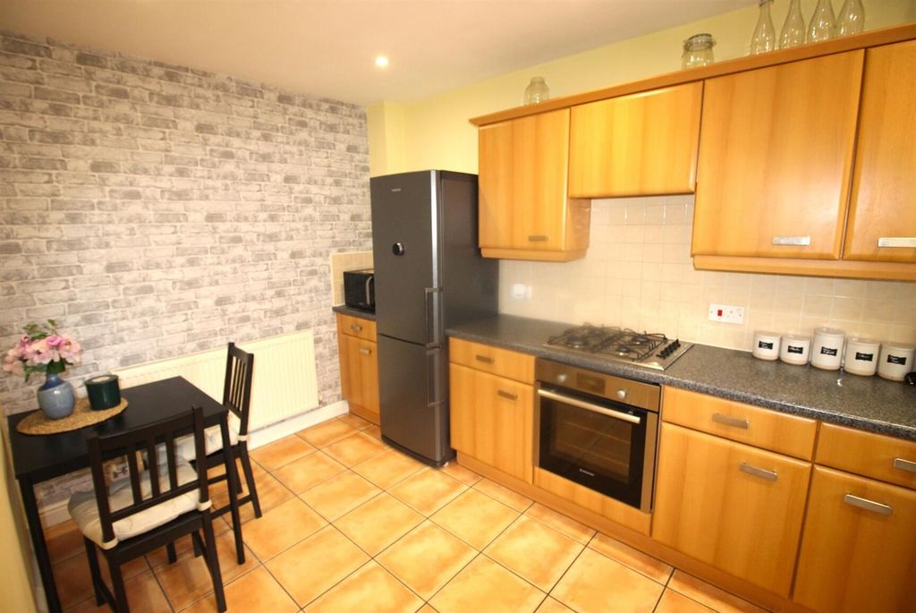 Property photo 3 of 15 Modern Kitchen With Stylish Breakfast Table...