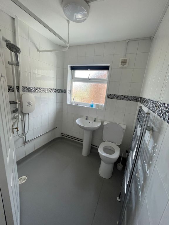 Property photo 2 of 12 A Spacious And Bright Bathroom Featuring A Walk-In...