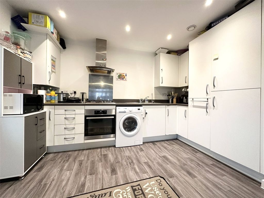 Property photo 3 of 12 Kitchen Area