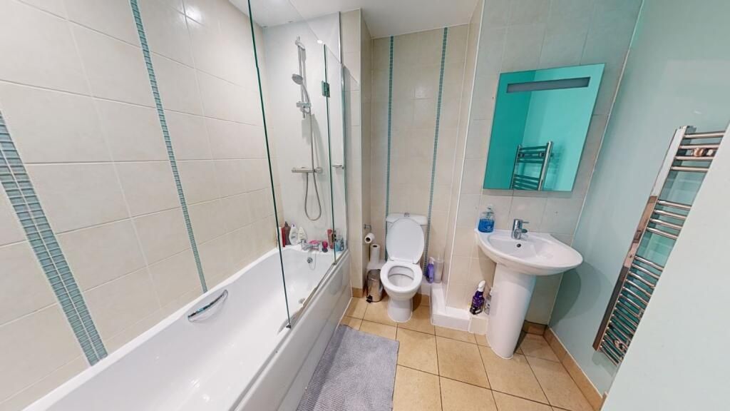 Property photo 2 of 6 A Bright, Clean, And Modern Bathroom Suite Featuri...