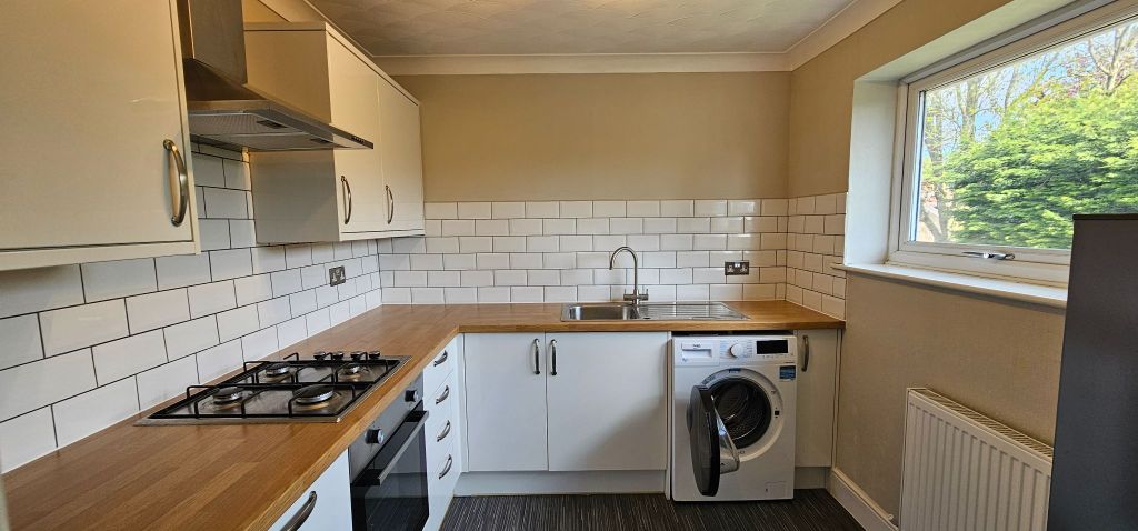 Property photo 3 of 8 Kitchen