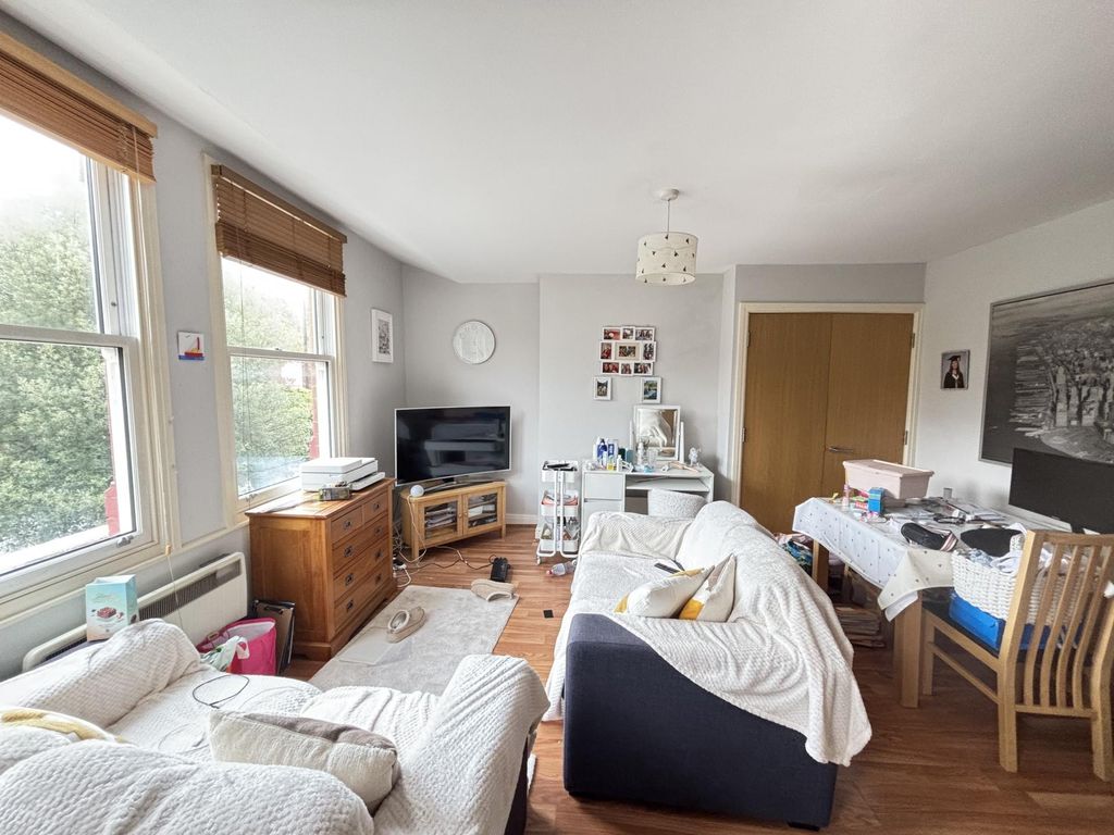 Property photo 2 of 16 A Spacious, Bright Living Room Filled With Natural...