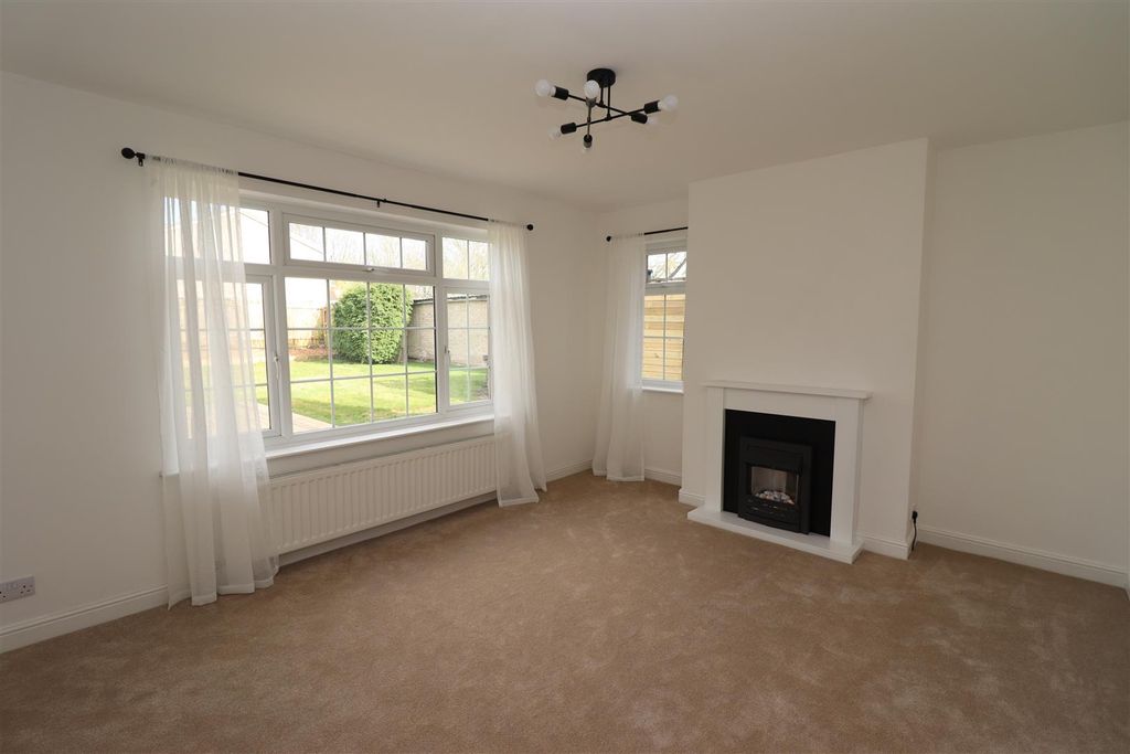 Property photo 3 of 8 Living Room