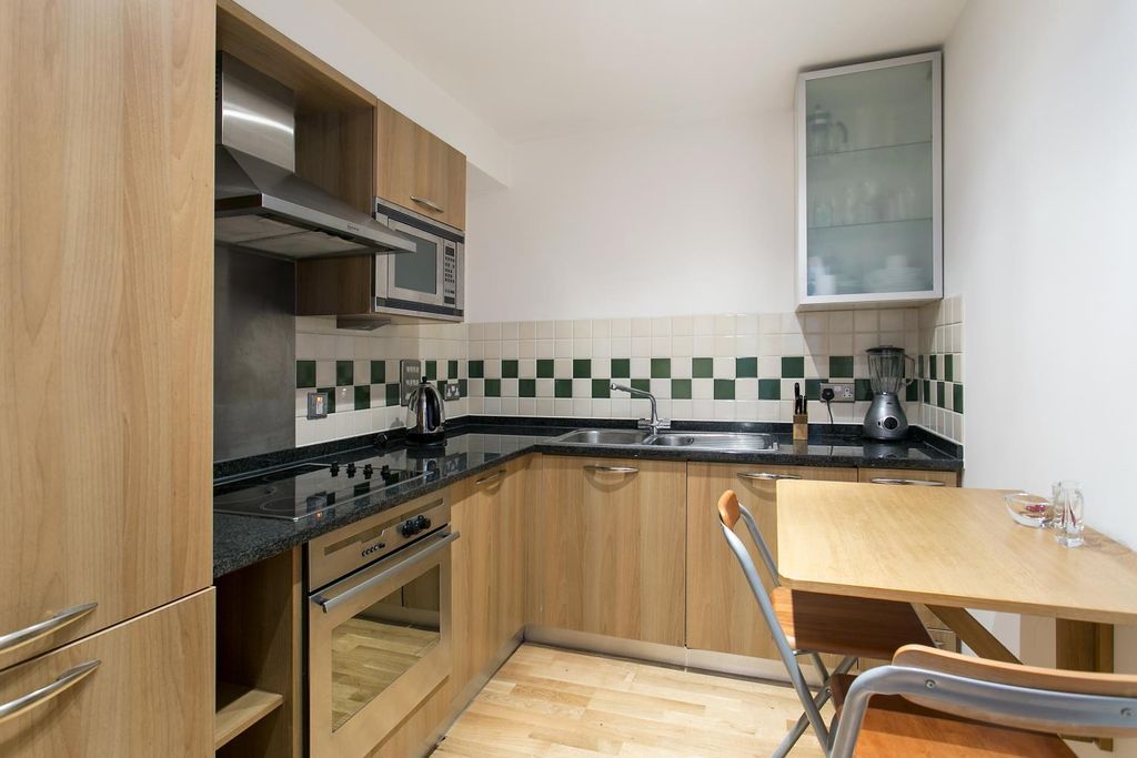 Property photo 3 of 7 Kitchen