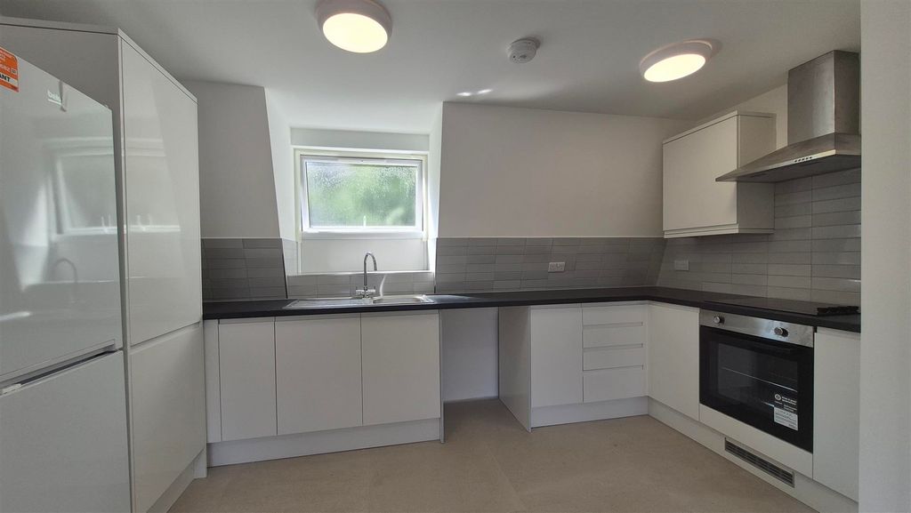 Property photo 1 of 8 Kitchen