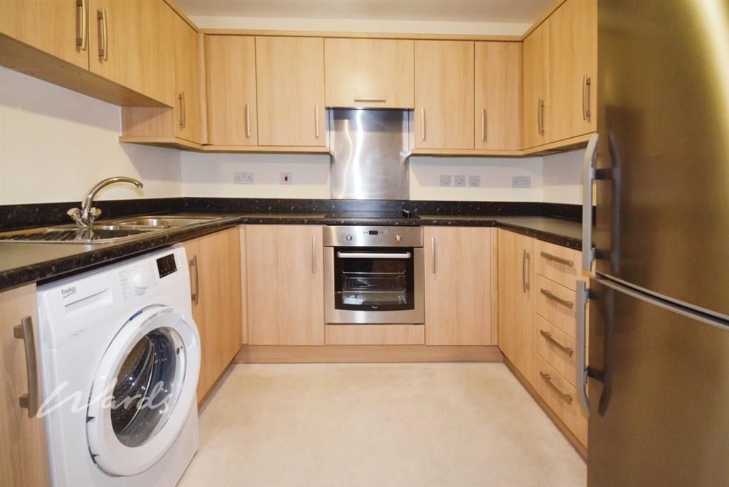 Property photo 3 of 8 Kitchen
