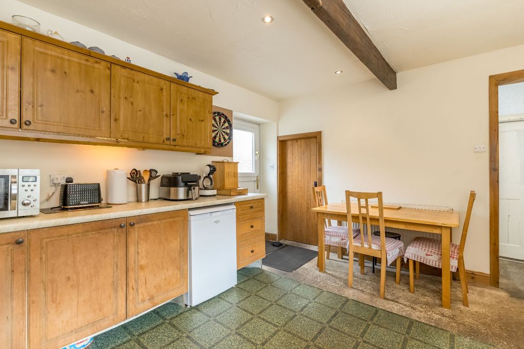 Property photo 3 of 12 Dining Kitchen