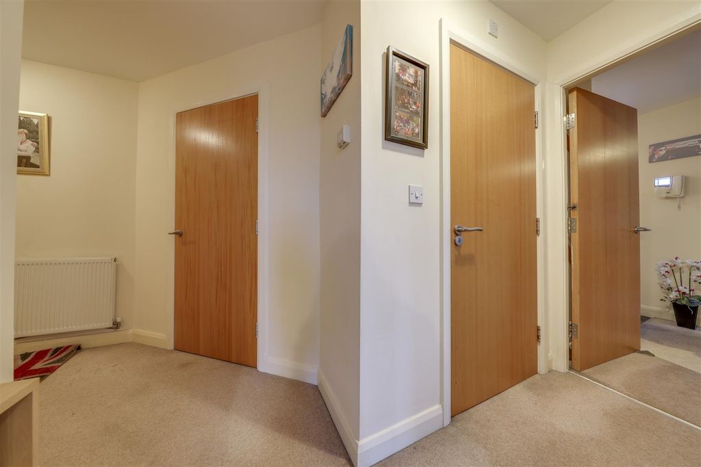 Property photo 3 of 11 Hallway With Storage